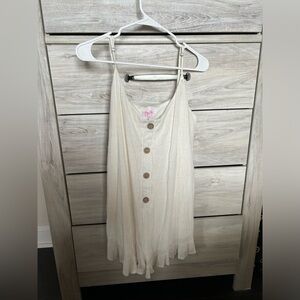 Pink lily romper never worn minor tear